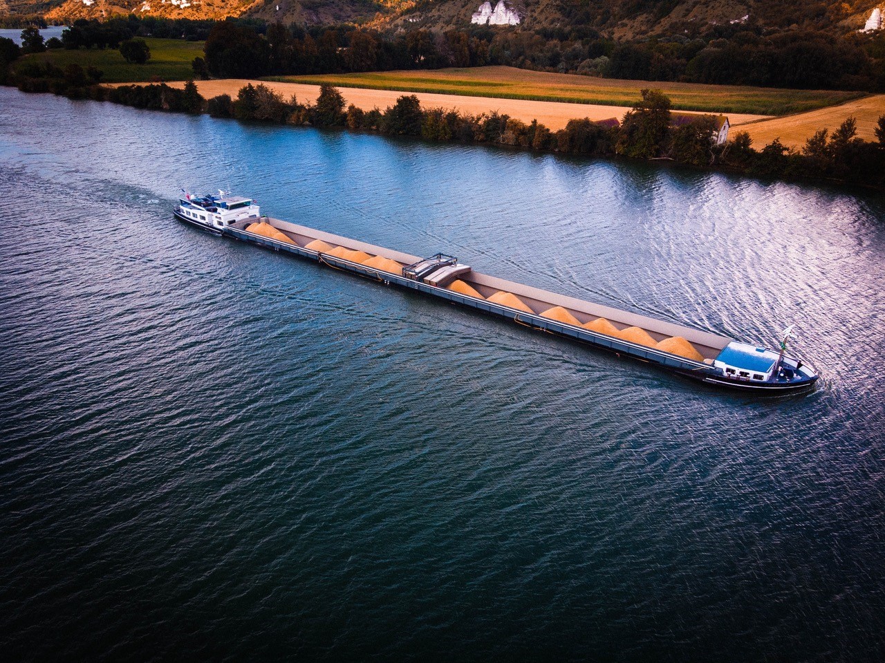 Grain barge on river waterway