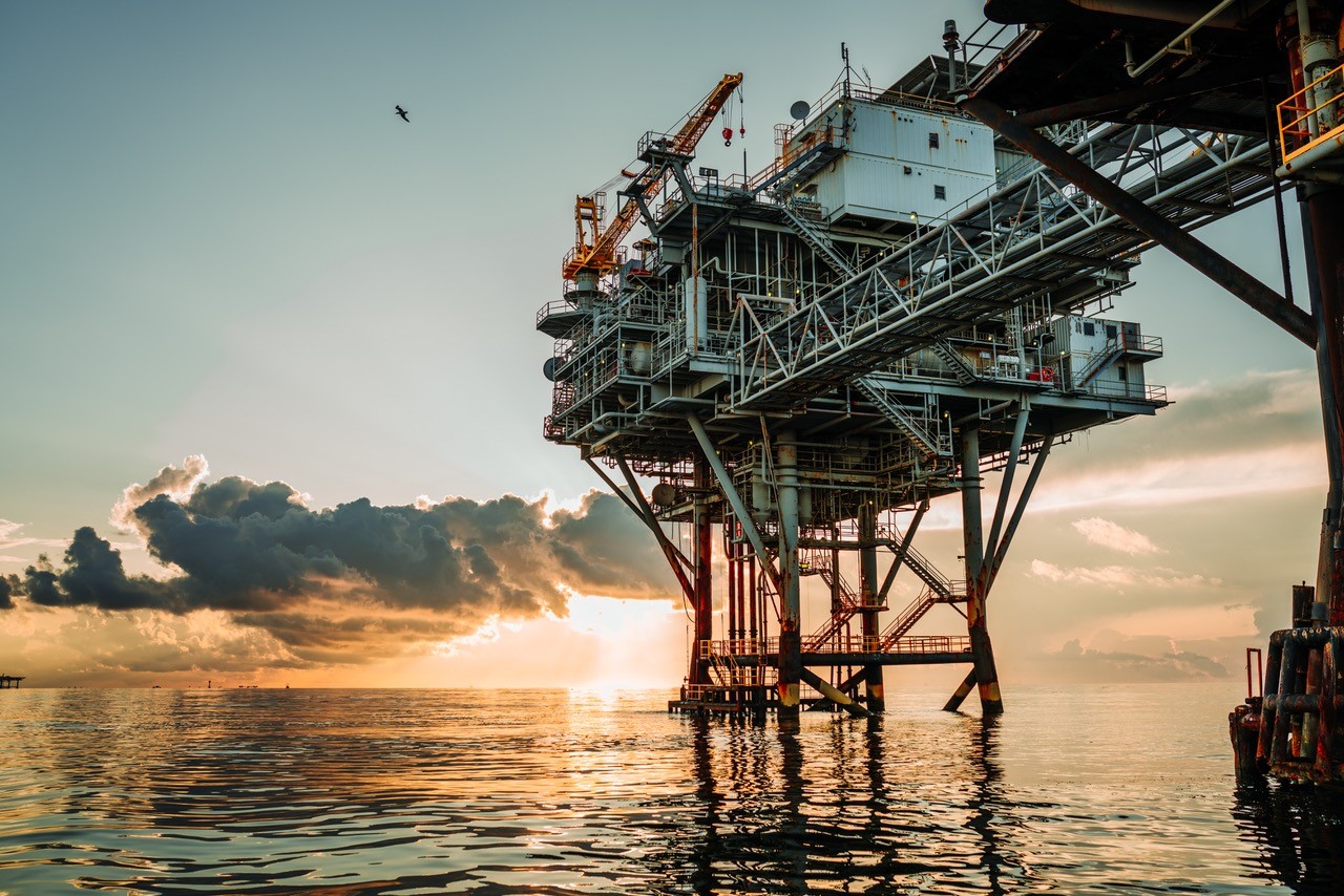 offshore oil rig at sunset